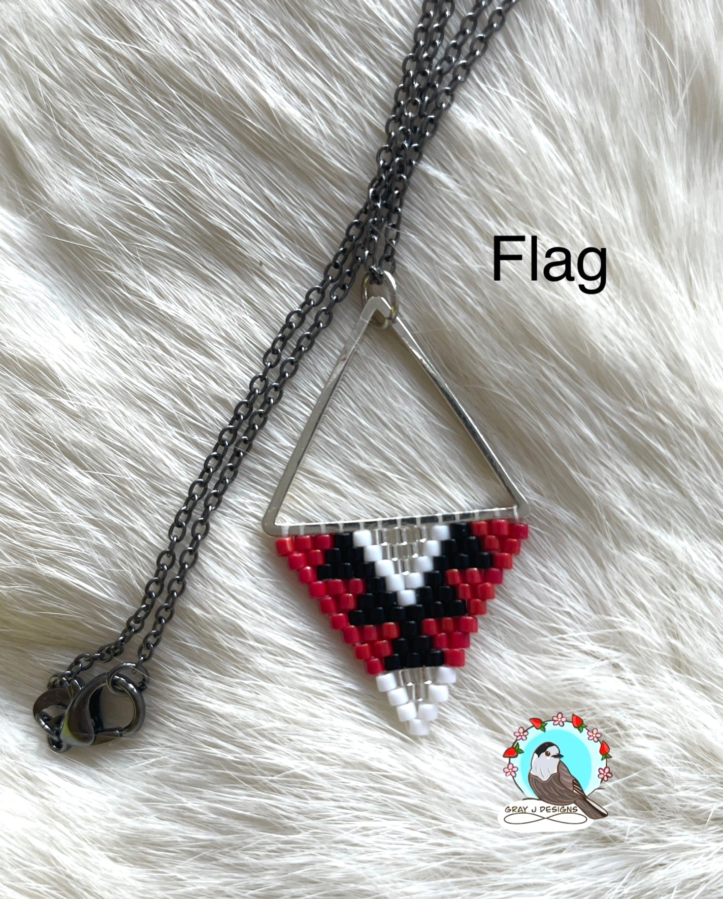 Beaded pendant on metal