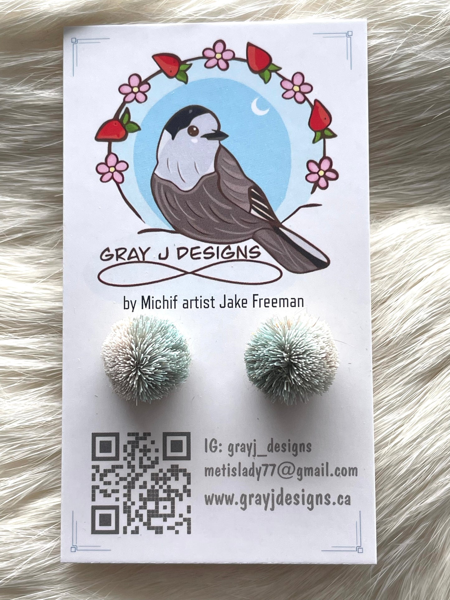 Caribou tuft stud earrings