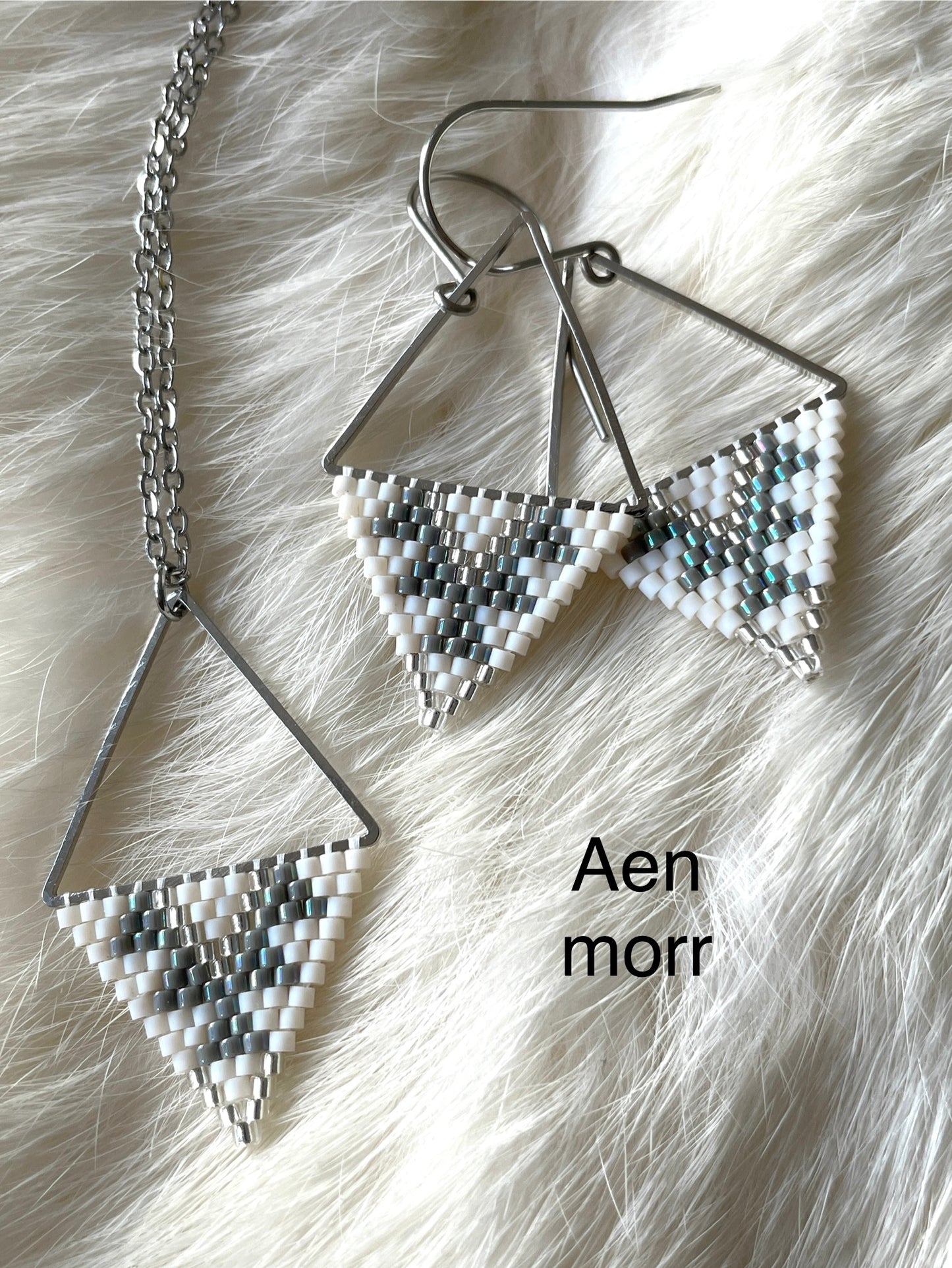 Beaded pendant on metal