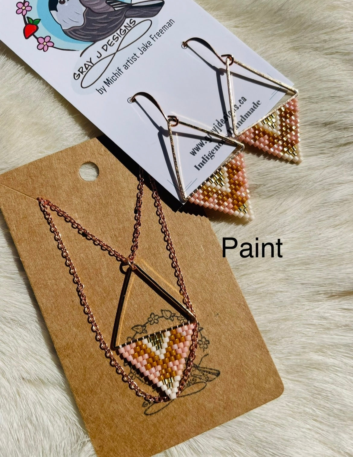 Beaded pendant on metal