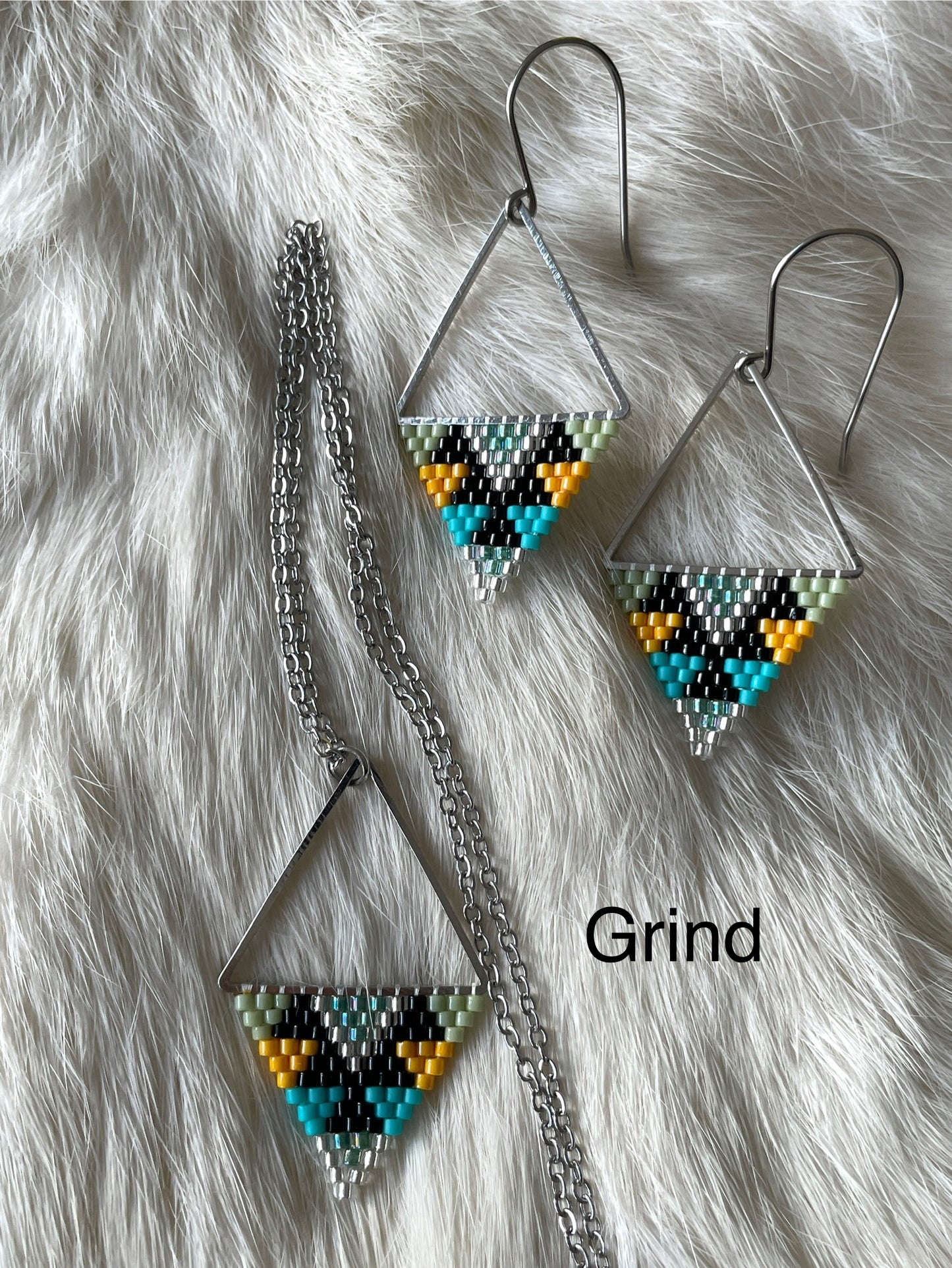 Beaded pendant on metal