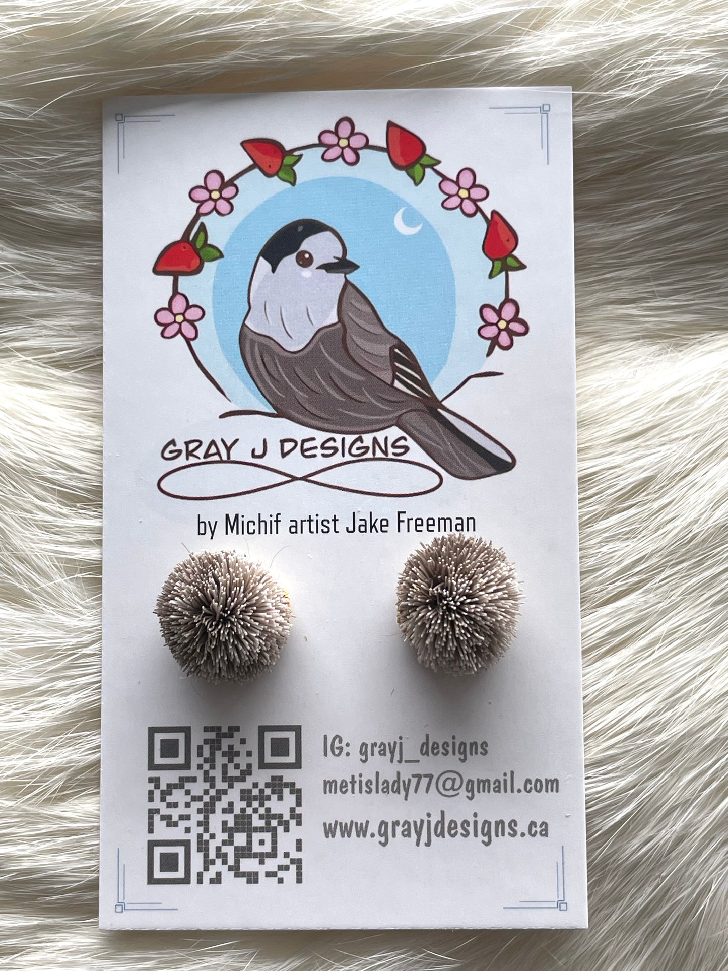 Caribou tuft stud earrings