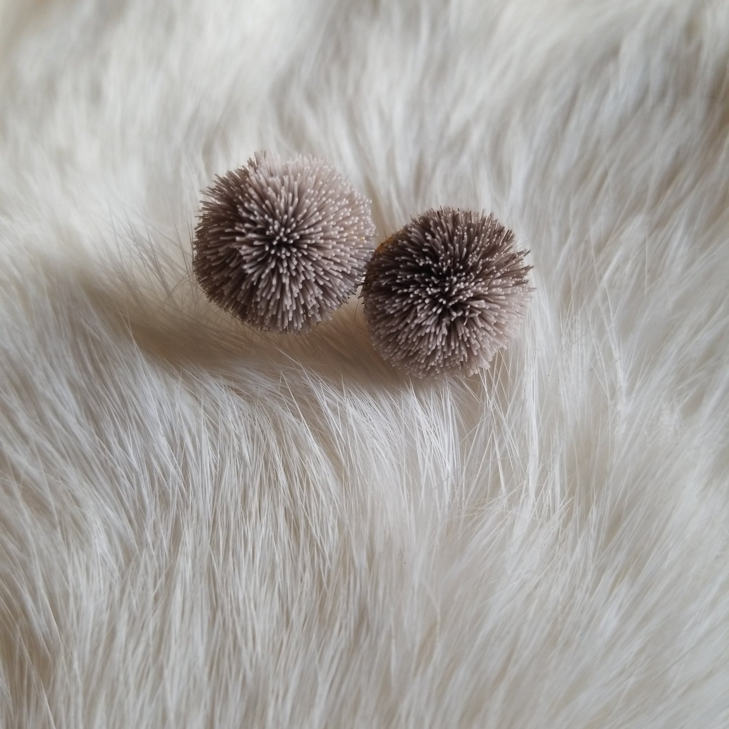 Caribou tuft stud earrings