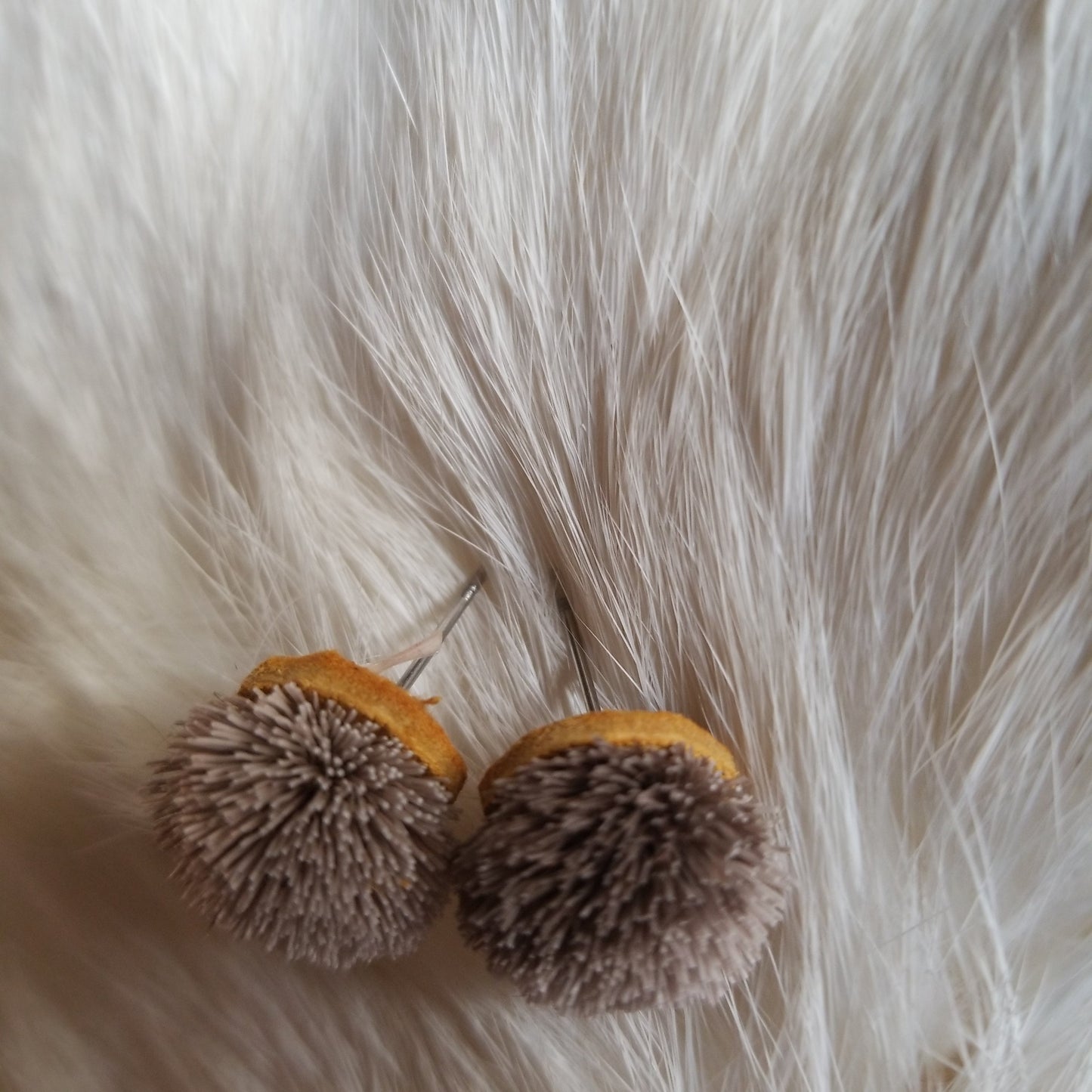Caribou tuft stud earrings