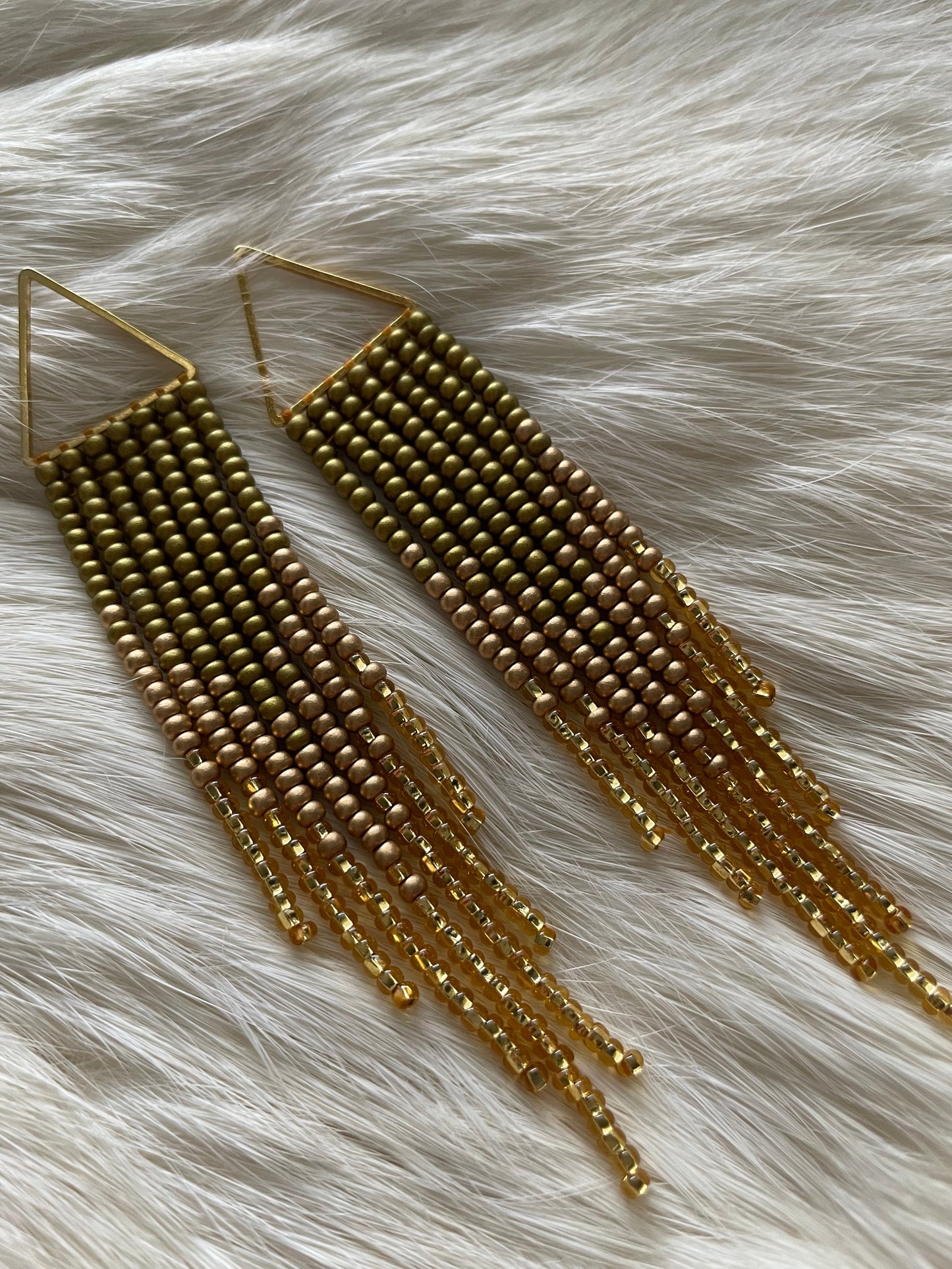 Long fringe on metallic shapes