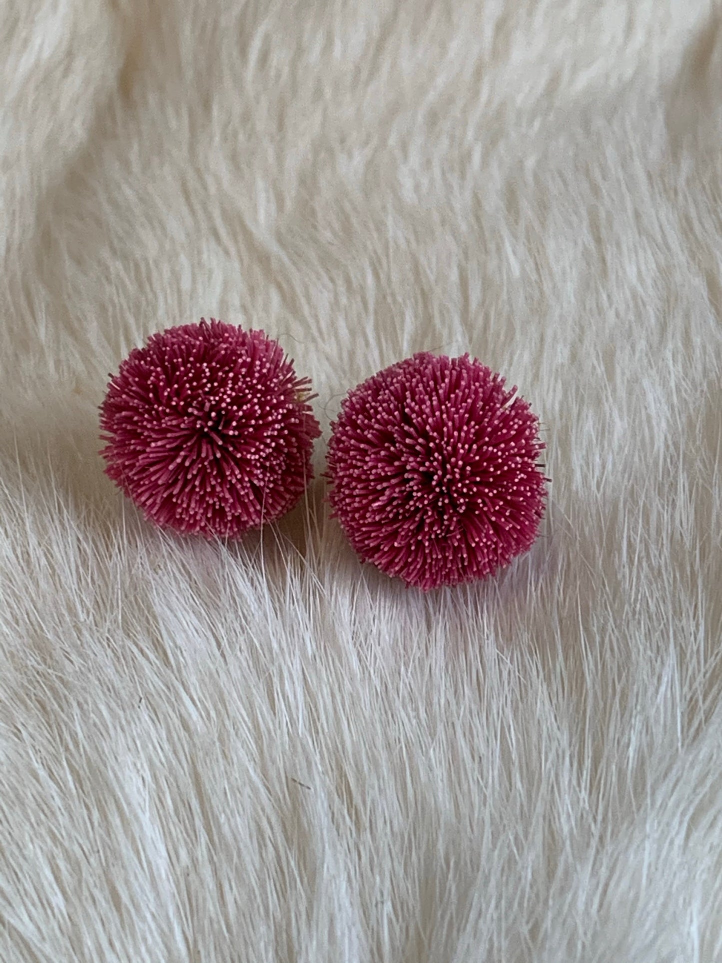 Caribou tuft stud earrings