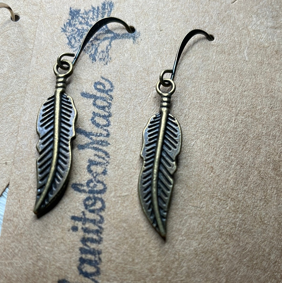 Feather charms