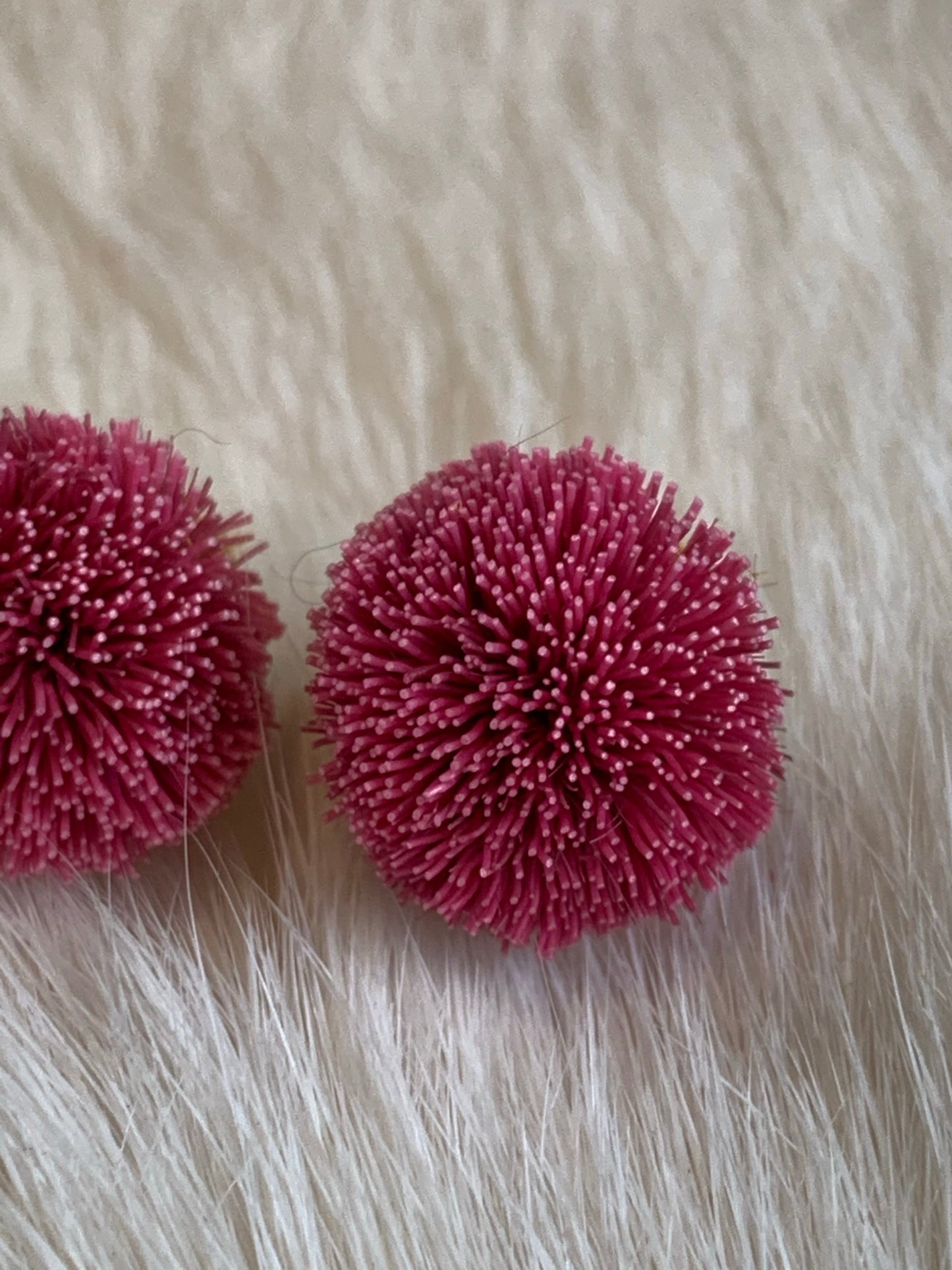 Caribou tuft stud earrings