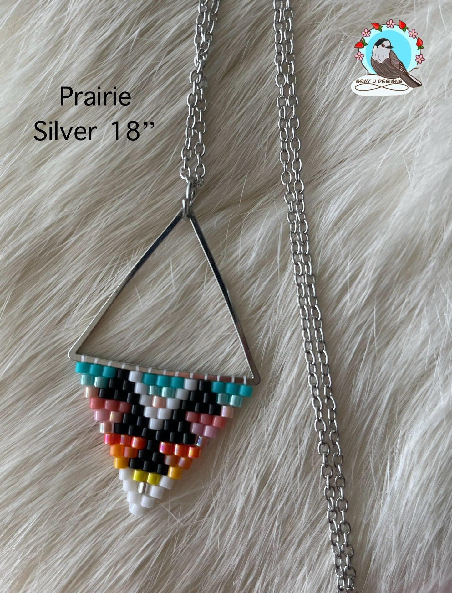 Beaded pendant on metal