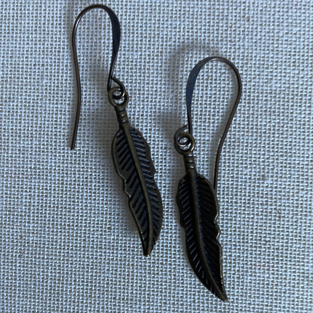 Feather charms