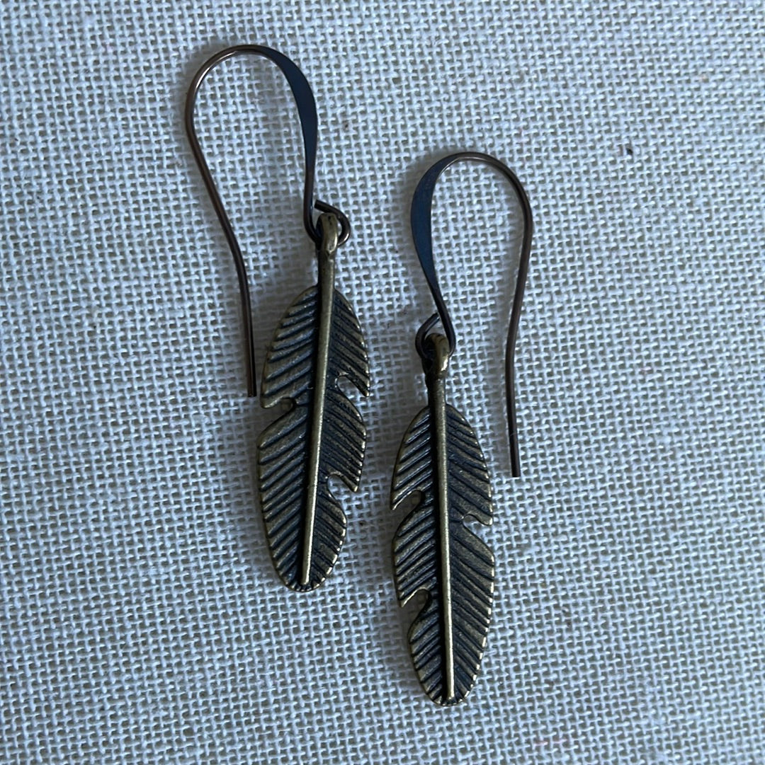 Feather charms