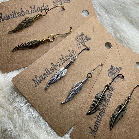 Feather charms