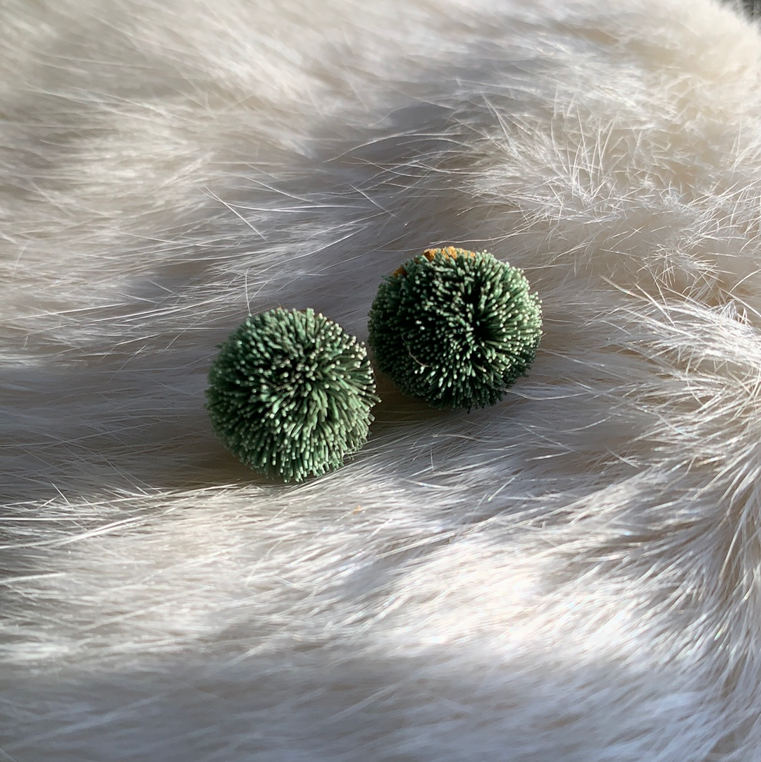 Caribou tuft stud earrings
