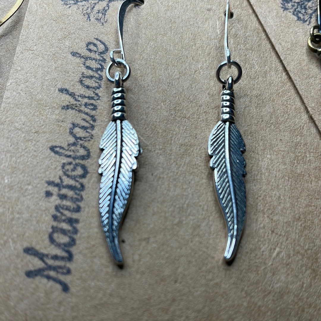 Feather charms